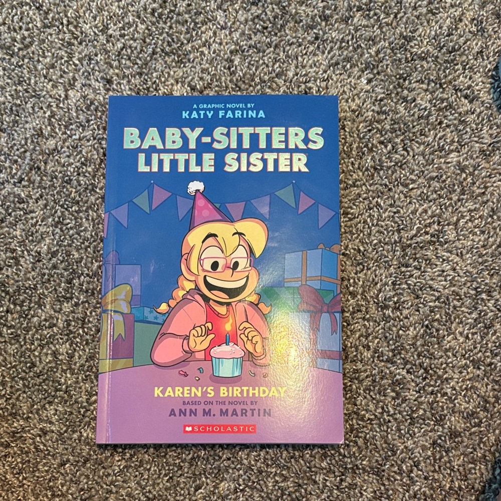 Scholastic Graphic Novel with Blue and Pink Cover